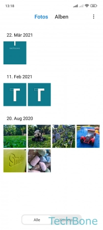 Schritt 2: Tippe und halte ein Foto / Video Fotos/Videos verschieben - Tippe und halte ein Foto / Video